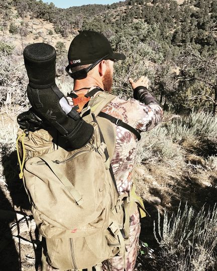 Cody Darling points out what he thinks might be the best route to use to get in on the big buck after it was spotted opening morning. The hunters abandoned three stalks when deer in the group with the big buck got edgy. The fourth stalk was the charm.